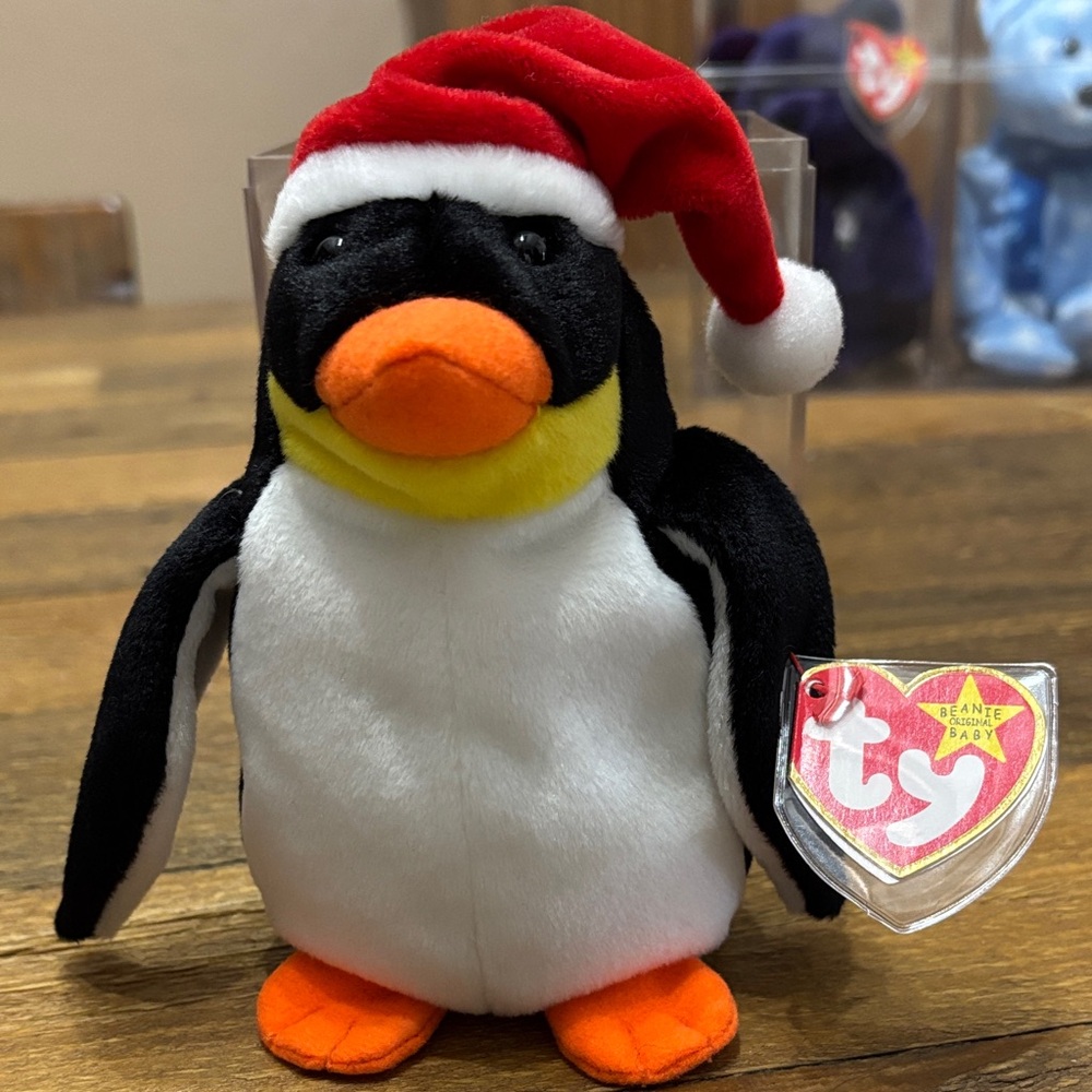 This is a Limited Edition Beanie Baby HOLIDAY ZERO THE PENGUIN W/ SANTA HAT